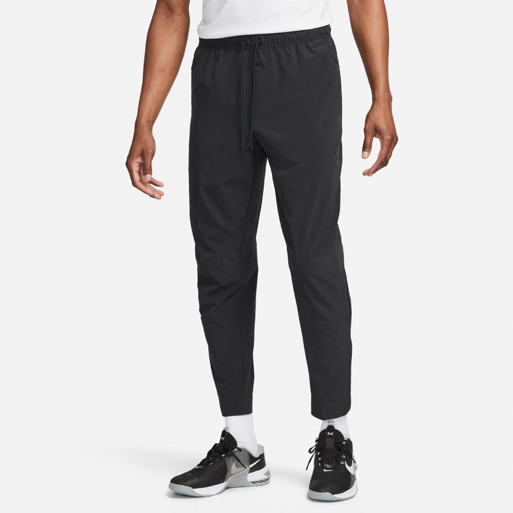 Чоловічі штани NIKE M NK Dri-FIT UNLIMITED PANT TPR FB7548-010
